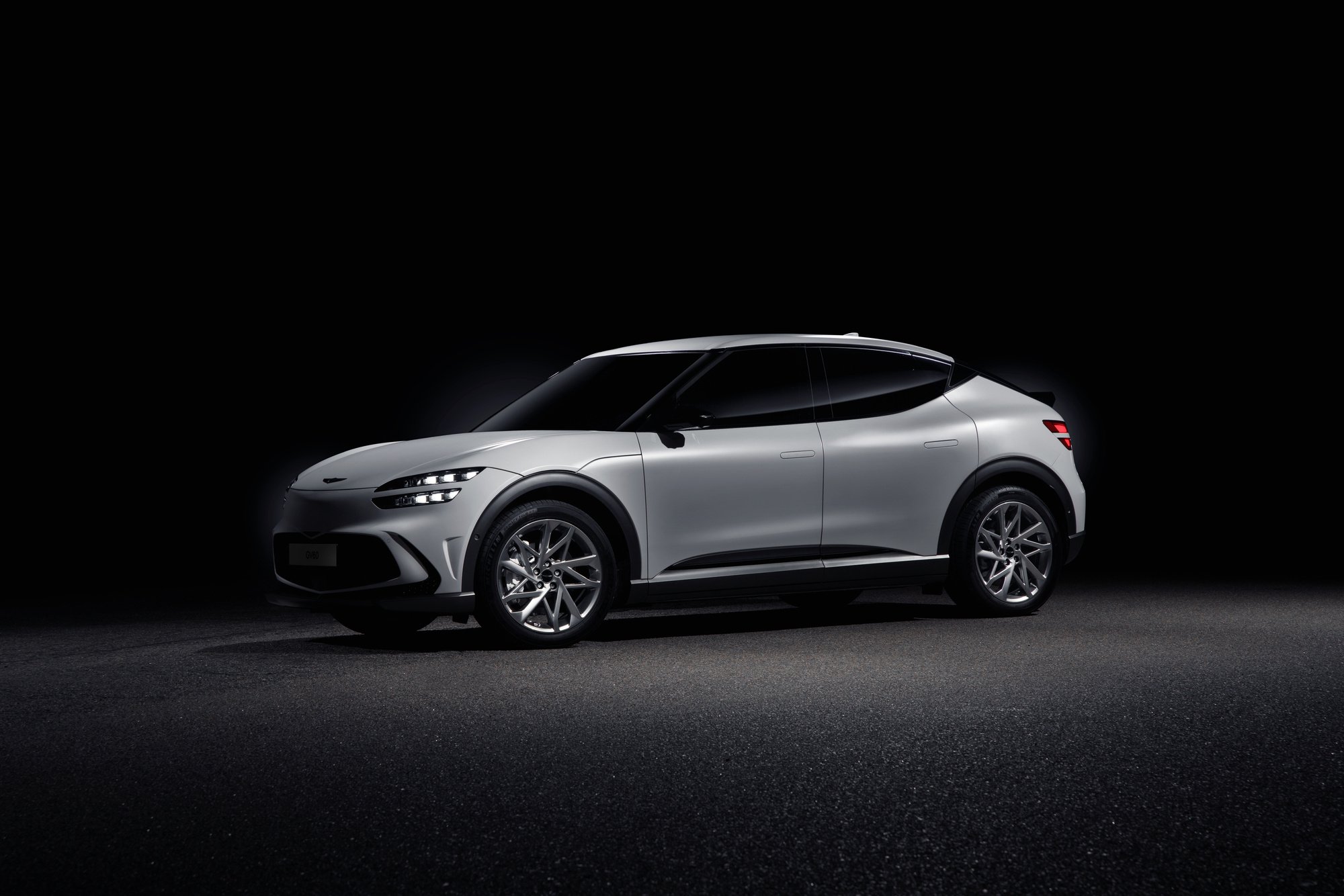 Side View of a Hyundai Genesis GV60 with a Black Background